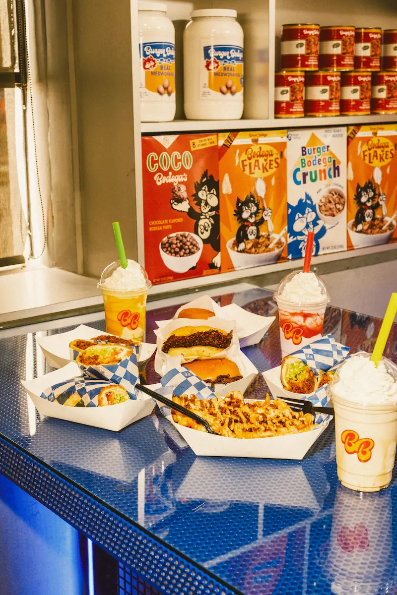 Burger Bodega smash burgers, loaded fries and shakes on the counter at the Washington Ave spot