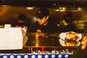 Fresh Burger Bodega smash burger with fries for late-night food in Houston